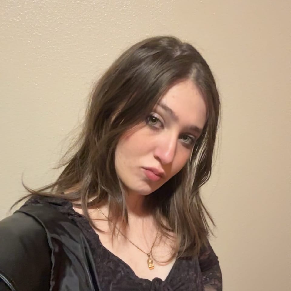 Deni blurry profile photo